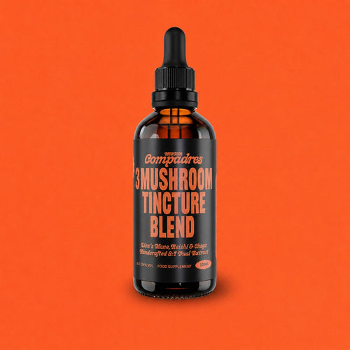 Bottle of 3 Mushroom Tincture Blend on an orange background